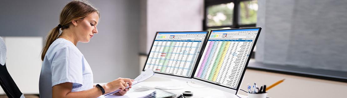 A student nurse works on an excel document on a computer