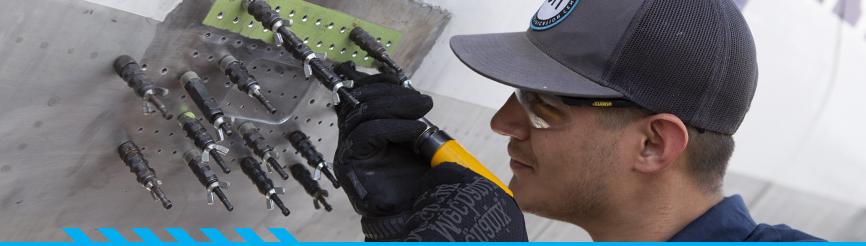 Aviation student working on airplane